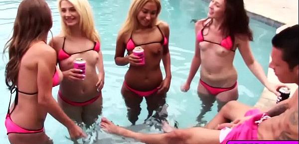  Sexy beach babes enjoy a hot group fucking action